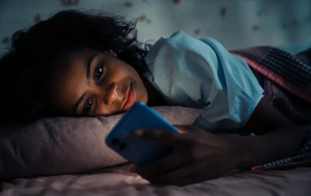 student up at night late staying on phone 