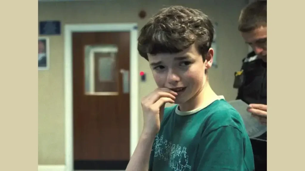 netflix series star, Jamie biting his nails looking straight at camera visibly nervous