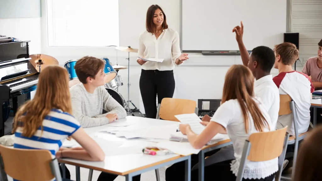 english teacher talking about emotions in class with students